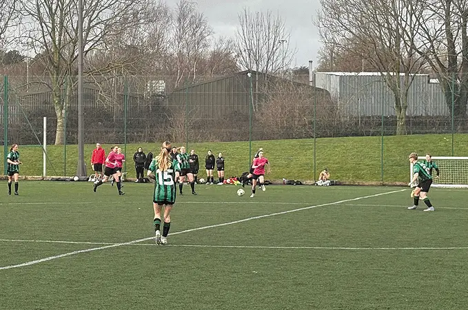 Grassroots football match on a Sunday afternoon